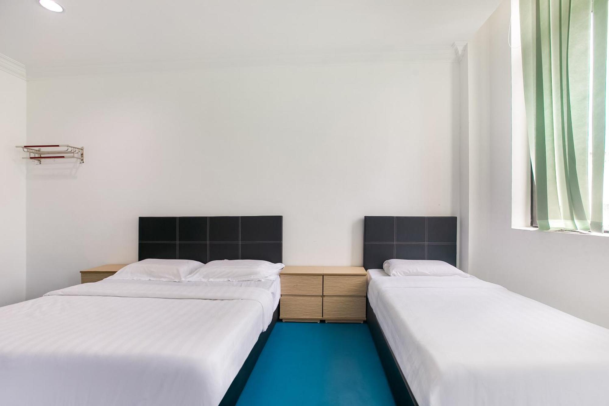 Spot On 89726 Capsule Inn Кота-Кинабалу Экстерьер фото