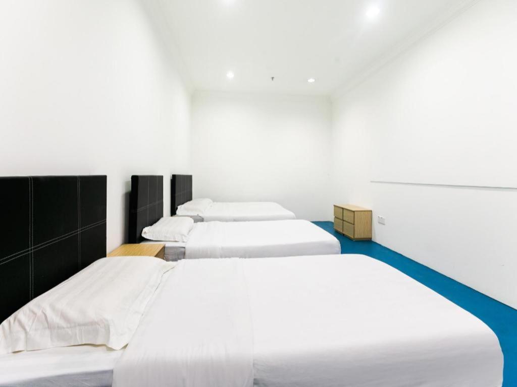 Spot On 89726 Capsule Inn Кота-Кинабалу Экстерьер фото