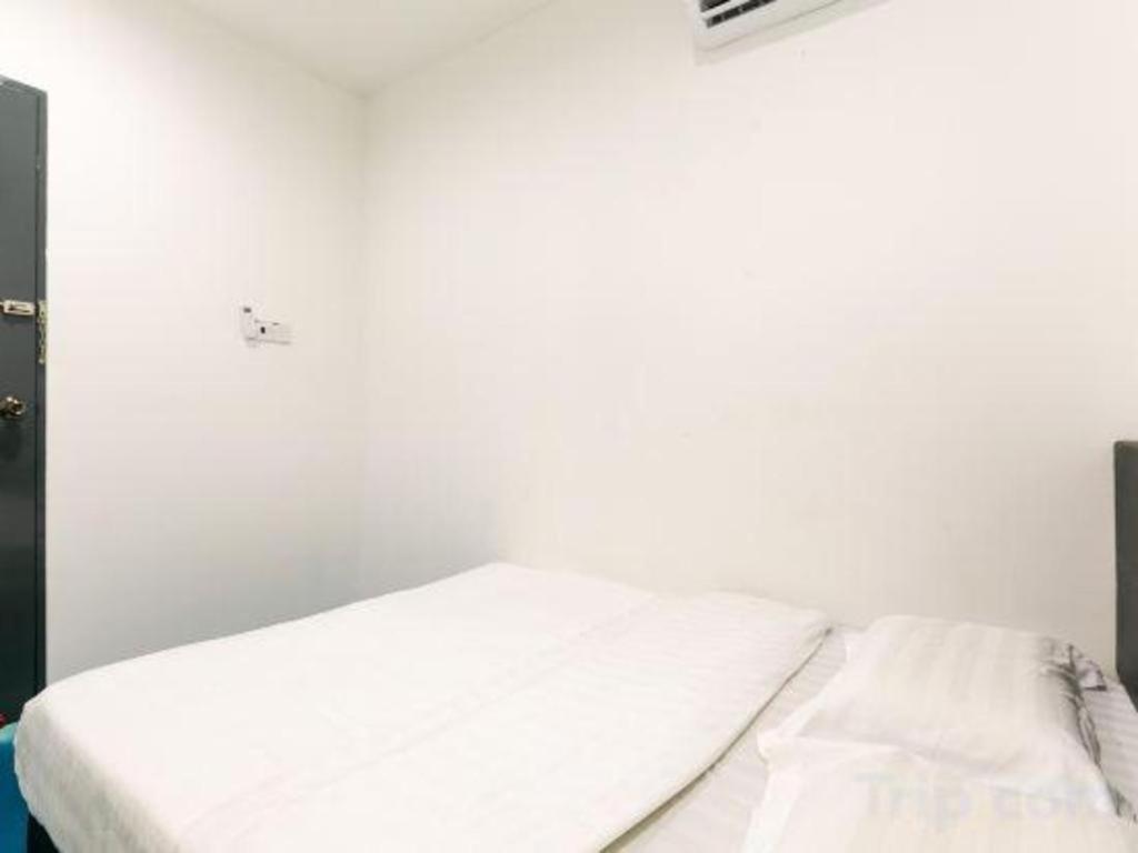 Spot On 89726 Capsule Inn Кота-Кинабалу Экстерьер фото