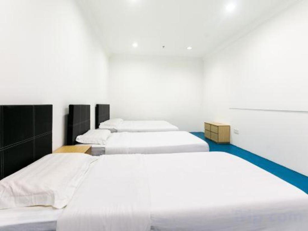 Spot On 89726 Capsule Inn Кота-Кинабалу Экстерьер фото